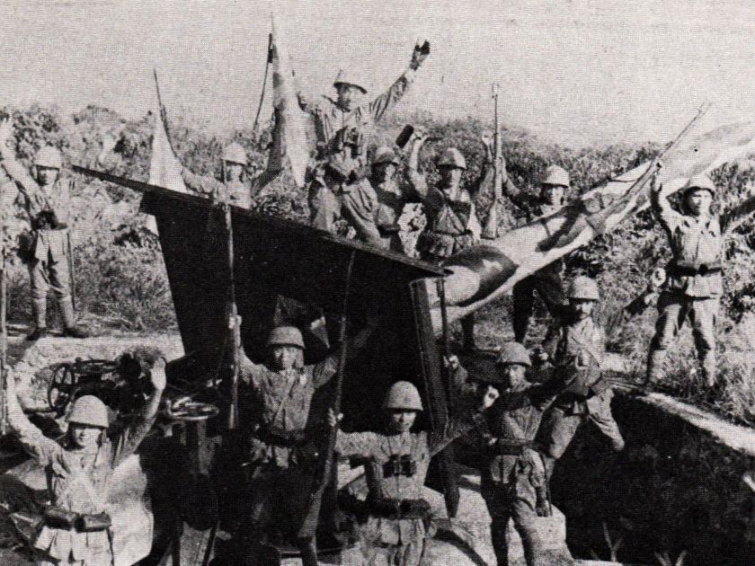 Japanese troops celebrate during the Battle of Singapore